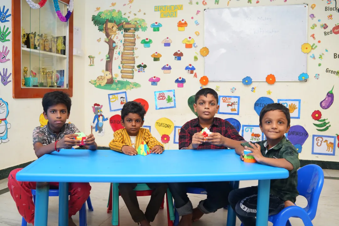 Students learning Rubik's Cube at Sparkling Topaz Academy